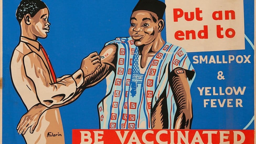 A man vaccinating another man next to the words: 